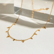 18K gold-plated cross necklace with small gold chain charms
