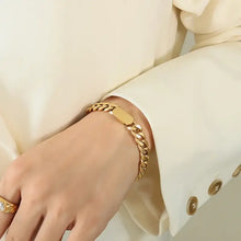 18k gold-plated Cuban link bracelet in titanium steel with ID bar on wrist