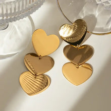 Two pairs of cascading 18k gold-plated heart earrings