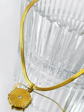 18K gold-plated hexagon sunburst pendant necklace with clear gemstones