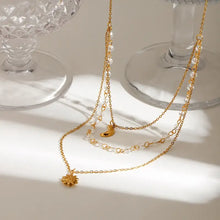 18k gold-plated layered necklace with sun and moon charms, crystal beads