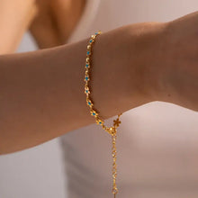 18k gold-plated resin beaded bracelet with turquoise flower links and extension chain