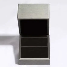 Open 18k gold-plated silver zircon ring in metallic box with black interior