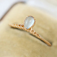 Elegant 925 sterling silver zircon ring with rose gold plating and pear-shaped light blue gemstone