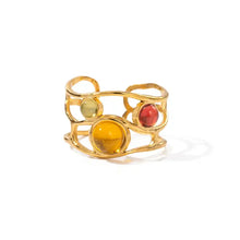 18K gold-plated ring with openwork design and red gemstones