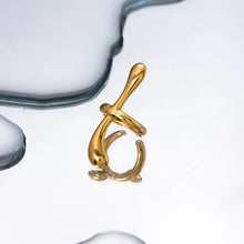 Pendiente abstracto de puño de acero inoxidable chapado en oro de 18k