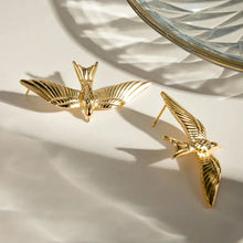 18k gold-plated stainless steel bird stud earrings with textured wings and pearl