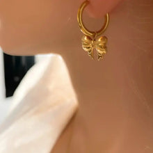 18k gold-plated stainless steel bow earrings with dangling bow charm