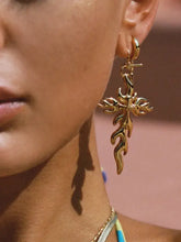 18k gold-plated stainless steel cross earrings with leaf design