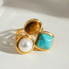 Three 18k gold-plated stainless steel open rings with tiger’s eye, pearl, turquoise