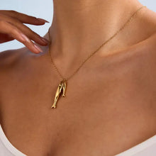 18k gold-plated stainless steel pendant necklace with double dolphin pendants
