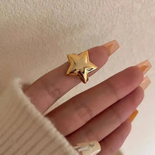 18K gold-plated stainless steel star ring on hand
