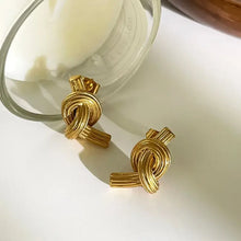 18k gold-plated stainless steel twisted knot stud earrings with textured design