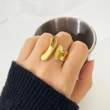 18k gold-plated stainless steel twisted open ring with gold stiletto heel design