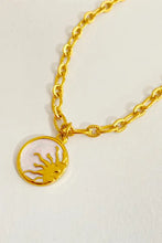 18k gold-plated steel necklace with round sun pendant and pale pink enamel