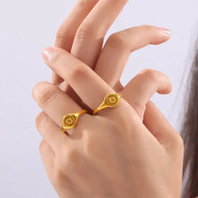 Two 18K gold-plated sun rings with engraved eye design