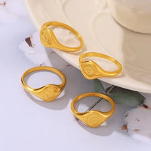 Four 18K gold-plated sun rings with textured circular design