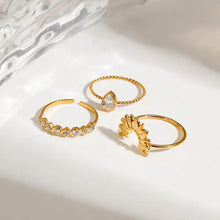 18k gold-plated sunburst crown ring set with pear-shaped rhinestone