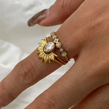 18k gold-plated sunburst crown ring set with pear-shaped rhinestone
