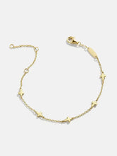 Armband aus titanbeschichtetem Stahl mit 18 Karat Gold, mit Stern- und Herzanhängern