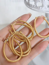 Shiny 18K gold-plated titanium steel oval hoop earrings