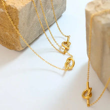 Three 18k gold-plated titanium steel knot necklaces