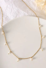 18k gold-plated titanium steel pearl necklace with dangling accents