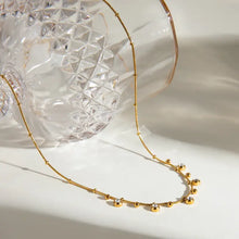 18k gold-plated titanium steel zircon necklace with gold beads and diamond accents