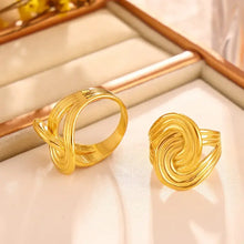 Two shiny 18K gold-plated twisted rings with knot-like designs