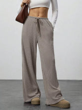 Beige ribbed corduroy relaxed fit wide leg pants with drawstring waist for comfortable leg pants style