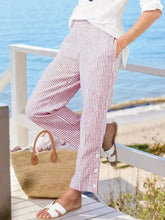 Full size striped side button detail pants plus size red and white vertically striped cotton trousers with buttoned cuffs for all-day comfort