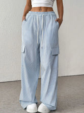 Light blue and white drawstring striped wide leg cargo pants with elastic waistband and multiple pockets