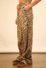 Very j animal print linen wide leg pants in loose beige and dark brown zebra pattern with drawstring waist and pockets