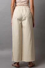 Beige pol distressed drawstring wide leg pants with elastic waistband and frayed hem for relaxed fit wear