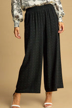 Black wide-leg embellished linen pants with subtle metallic dots from umgee plus size collection