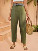 Olive green high-waisted casual wide leg pants with front pockets and a patterned belt for versatile wear