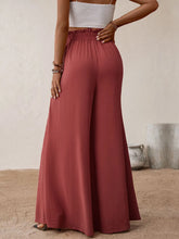 Perfee frill tied wide leg rust-colored flowing pants with high-waisted elastic waistband for comfortable wear