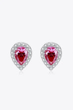2 carat moissanite teardrop stud earrings in rose with pink sapphire halo