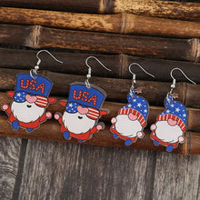 Four pairs of dangling patriotic acrylic gnome earrings
