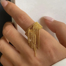 18k gold-plated stainless steel tassel chain ring with gold beaded fringe on hand