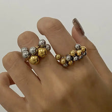 Two-tone 18k gold-plated stainless steel bubble cluster ring on fingers