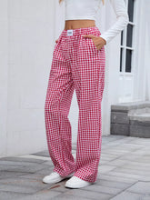 Red and white gingham check plaid wide leg casual pants with elastic waistband and comfortable fabric design