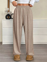 Beige heathered casual drawstring waist wide leg sweatpants with elastic waistband and matching drawstring