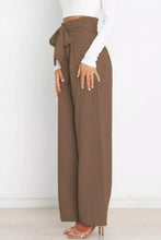 Brown high waist tie front wide leg pants featuring a tied waistband and relaxed fit for stylish comfort