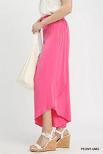 Umgee vibrant pink flowy asymmetrical hem wide leg pants with high-waisted design and subtle side chain detailing