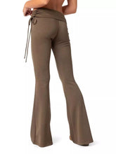Brown high-waisted flare pants in polyester fabric featuring a drawstring waistband for comfortable wear