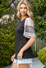 Black ribbed round neck top with leopard lace trim sleeves