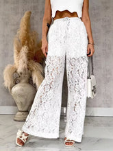 White lace wide-leg pants with floral pattern and drawstring waist perfect for elegant casual wear
