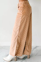 Tan corduroy wide leg pants with white polka dot print and drawstring waist for casual wear
