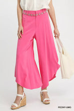 Bright pink umgee flowy asymmetrical hem wide-leg pants with decorative floral belt detail for stylish wear